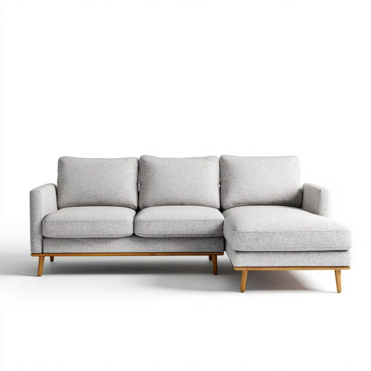 Jasnoszara sofa narożna z prawostronnym szezlongiem i drewnianymi nogami 260 × 160 × 85 cm